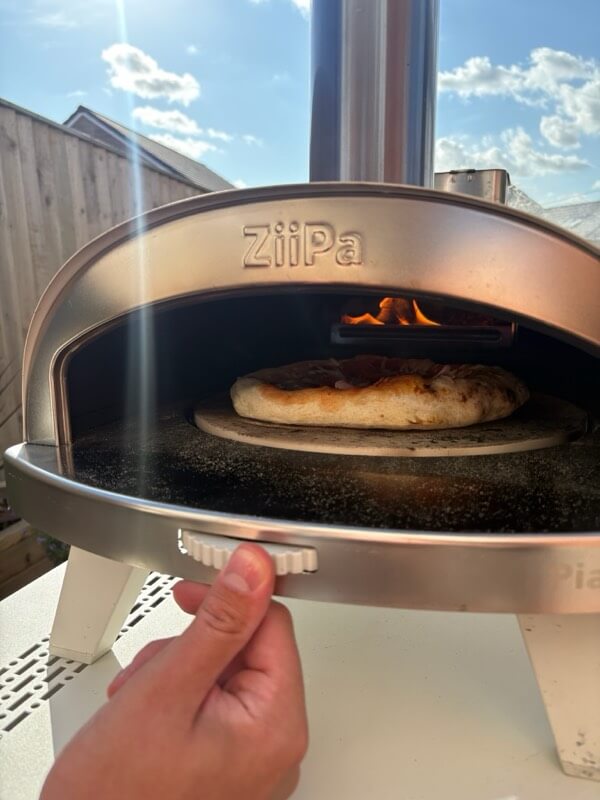 ZiiPa Piana pizza oven being used to cook a pizza
