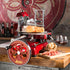 Berkel Volano B3 flywheel slicer on a countertop in a rustic kitchen, alongside win, prosciutto and bread.