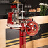 Vintage style red Berkel flywheel slicer on a stand