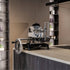 Berkel Volano B3 flywheel slicer on a countertop in a modern kitchen