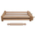 Traditional Chitarra and rolling pin for making spaghetti on a white background