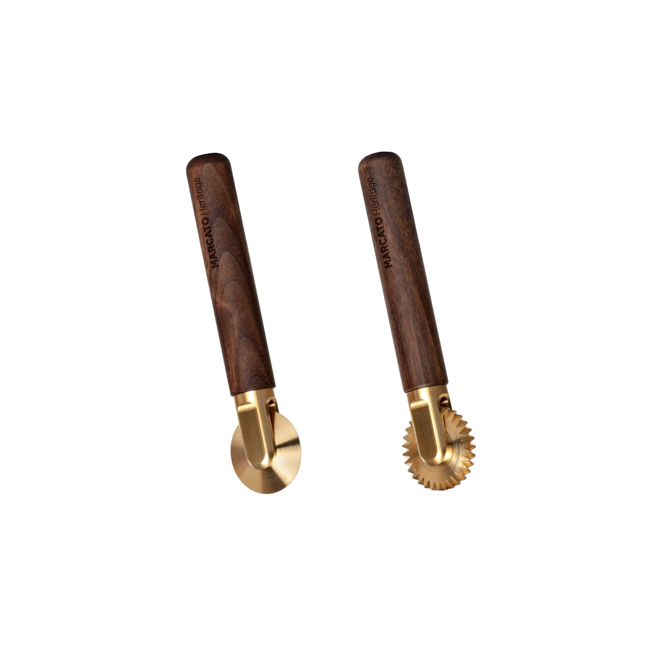 Two wooden-handled brass pasta cutters on a white background