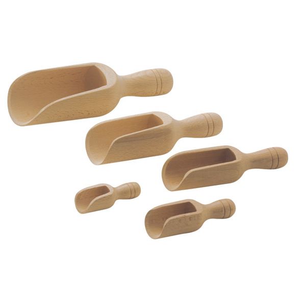 Set of five wooden scoops of different sizes on a white background