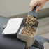 ZiiPa Melfa pellet scoop in Charcoal being used to load wood pellets into a Donato pellet dispenser for a Piano pizza oven