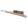 ZiiPa Ranella pizza stone cleaning brush showing stainless steel bristles and integrated scraper blade with oak handle and leather hanging cord