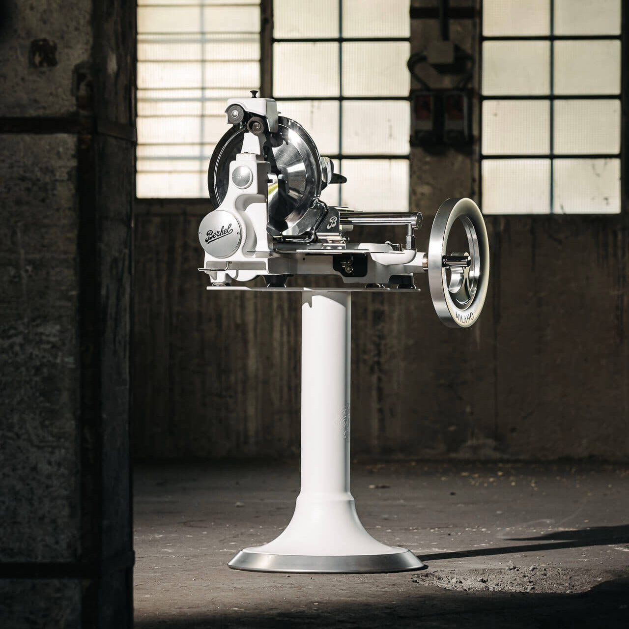 Lifestyle image of Berkel Volano B114X flywheel slicer in an industrial style building