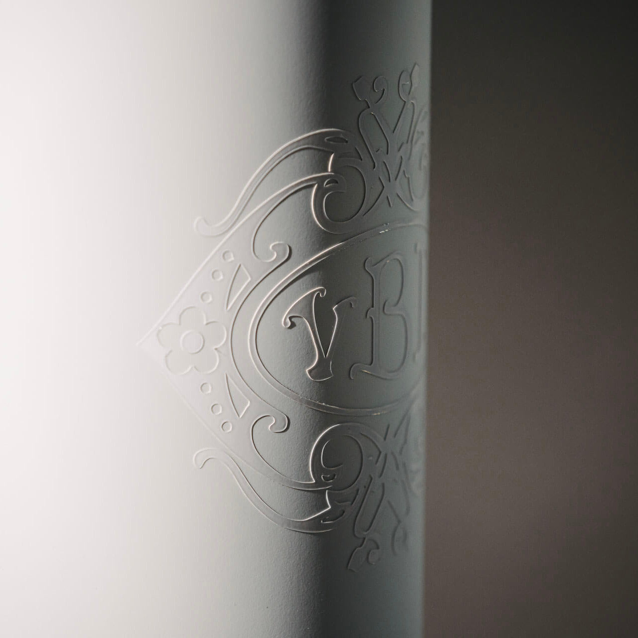 Close-up of intricate Van Berkel International branding on the stand for the Berkel Volano B114X flywheel slicer